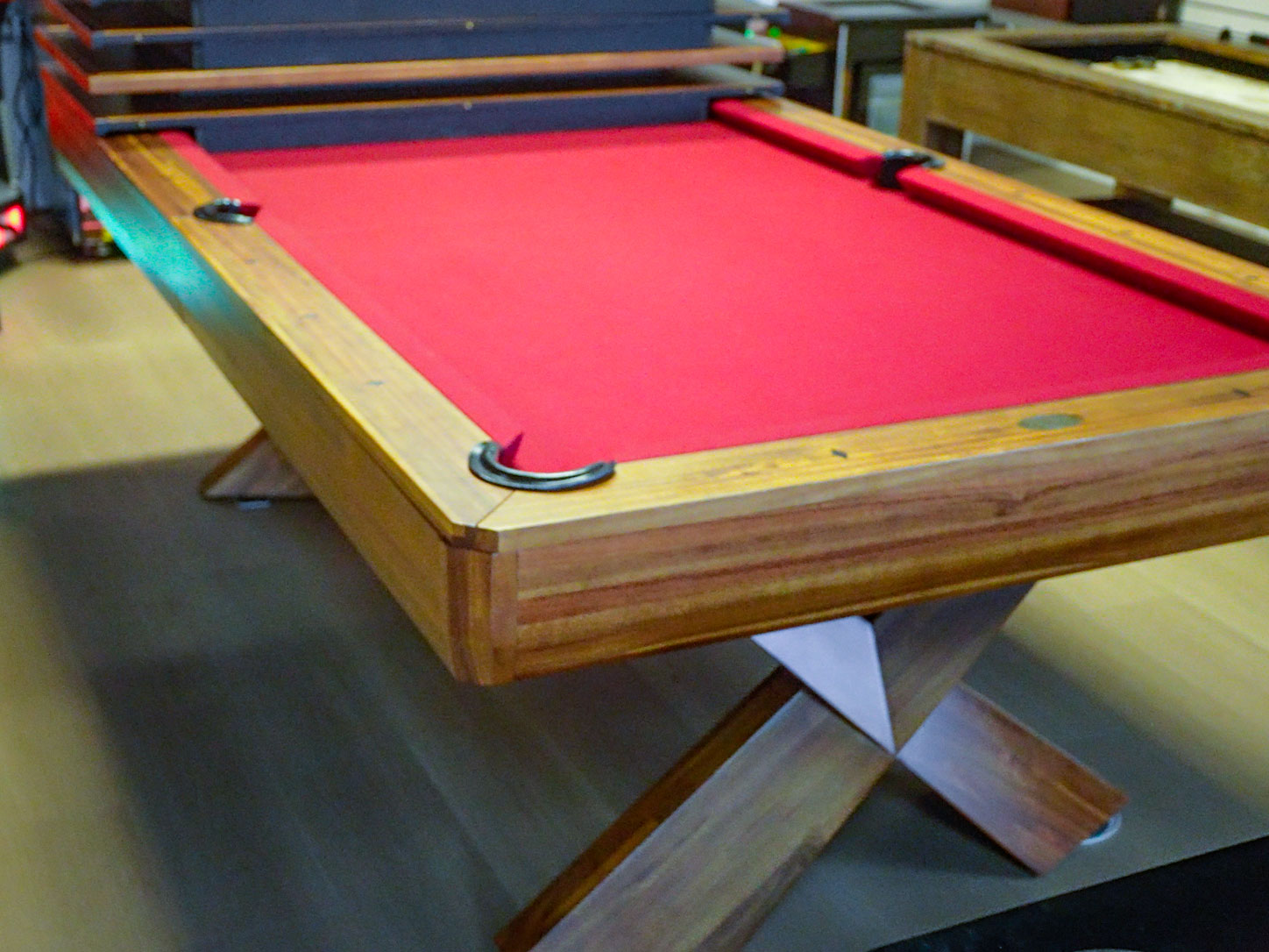 Pool table with red felt — showroom